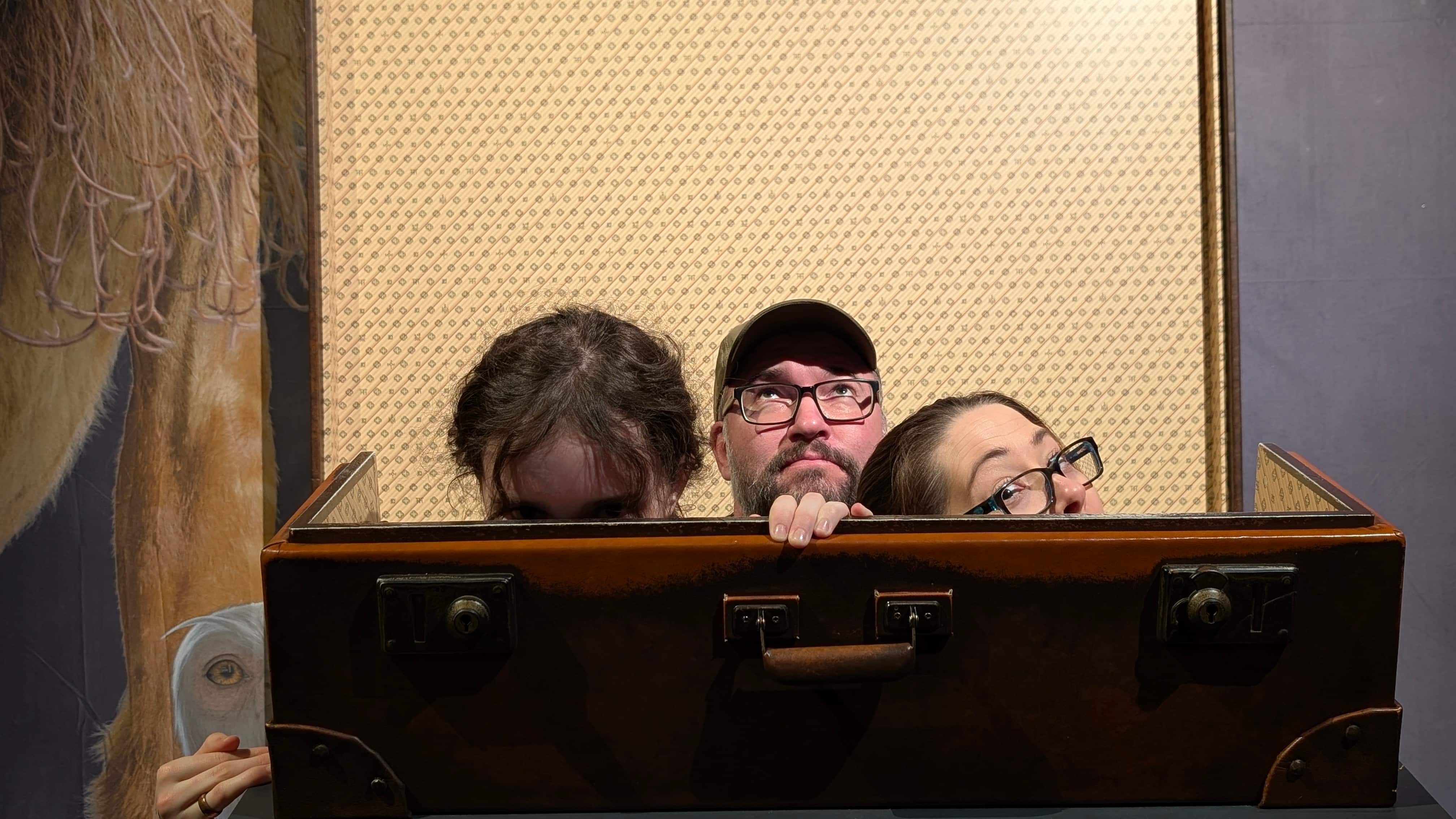 Three of us in a Harry Potter suitcase prop at the exhibition